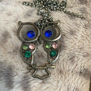 Owl necklace with blue eyes and pink and green stones